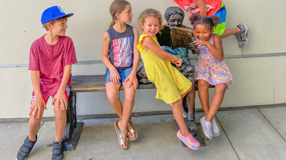 kids together on a bench